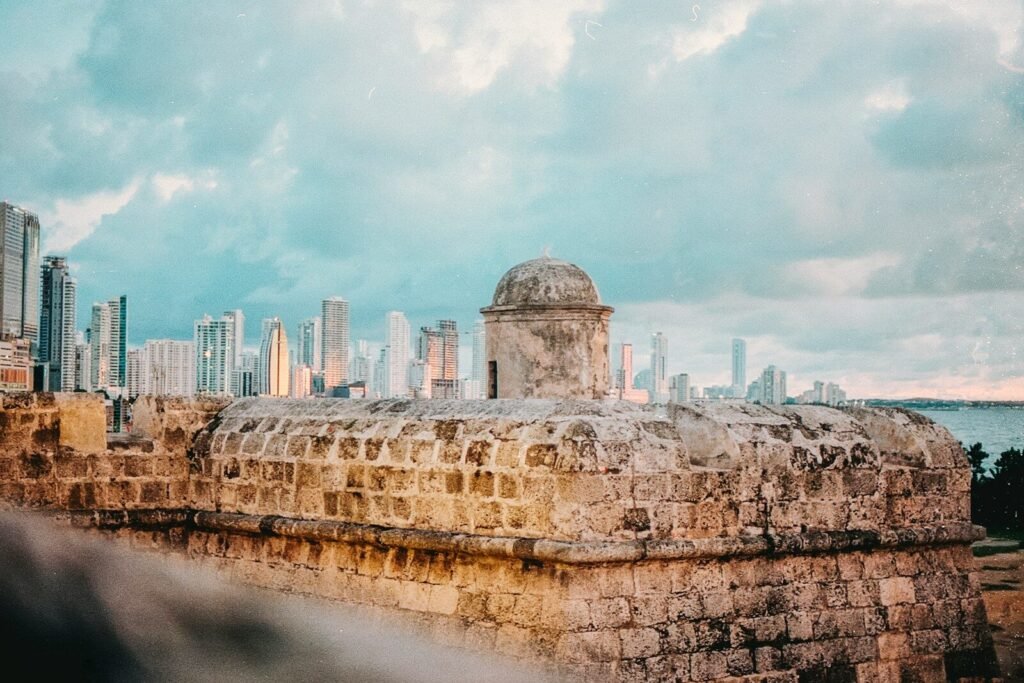 a view of a city from the top of a wall